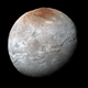 Pluto’s largest moon, Charon.